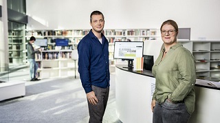 Two employees in the museum reading room of the German National Library in Leipzig