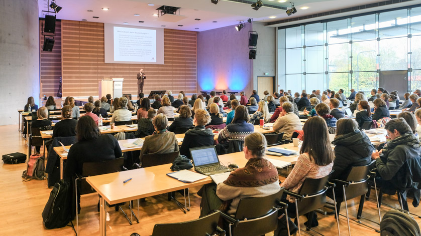 Participants at a professional event in the lecture hall of the German National Library in Frankfurt am Main