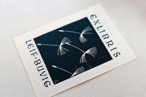 Picture of a bookplate, design: seeds from a dandelion clock
