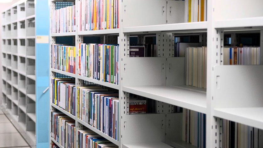 Shelves – some full, some still empty – in the compact units installed in our stacks in Frankfurt am Main