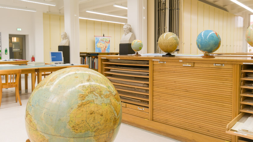 The German National Library’s map reading room in Leipzig; map cupboards and three of our globes