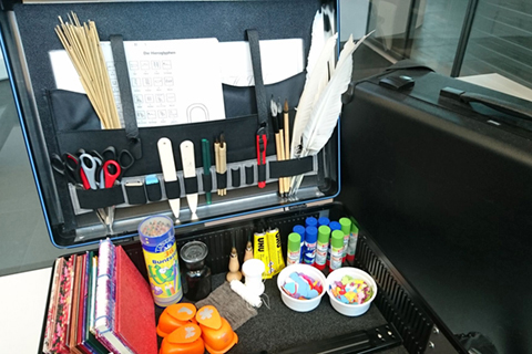 Suitcase with various materials for handcrafting Suitcase with various materials for handcrafting