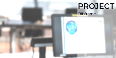 In the background, out of focus, people working in a project group. Project title in the foreground In the background, out of focus, people working in a project group. Project title in the foreground