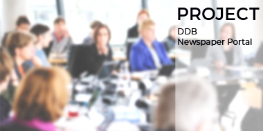 In the background, out of focus, people working in a project group. Project title in the foreground In the background, out of focus, people working in a project group. Project title in the foreground